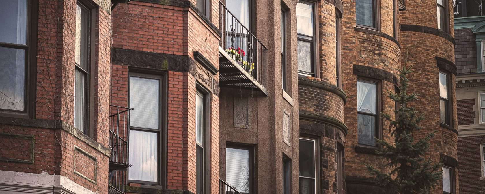 Brick buildings with windows.